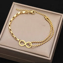 Pulseira dupla com símbolo Feminina Banhada Ouro